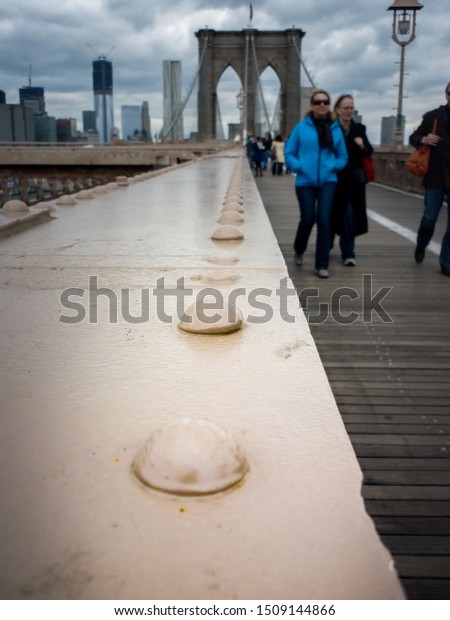 NY,NY/ United States - 4/1/12: Closeup of the\
Brooklyn Bridge rails