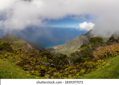 Pu’u O Kila Lookout Offering Panoramas Of The Valley, Ridged Mountains And Pacific Ocean At The Kauai Island Of Hawaii Archipelago