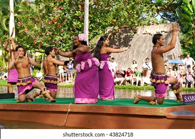 OAHU, HAWAII - DECEMBER 24: Polynesian Cultural Center. Students From Brigham Young University-Hawaiii Perform A Traditional Samoan Dance On A Canoe On Christmas Eve, December 24, 2008.