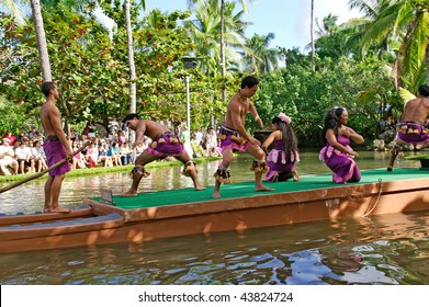 OAHU, HAWAII - DECEMBER 24: Polynesian Cultural Center. Students From Brigham Young University-Hawaii Perform A Traditional Samoan Dance On A Canoe On Christmas Eve, December 24, 2008.