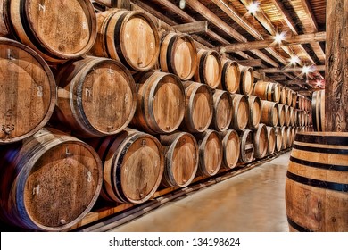 Oak Barrels Maturing Beer In Belgium