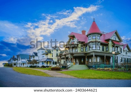 Oak Bluffs skyline at sunrise with landmark houses and dramatic winter cloudscape over the Ocean Park on Martha's Vineyard, Massachusetts, Unites States