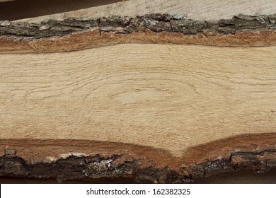 Oak board with bark.