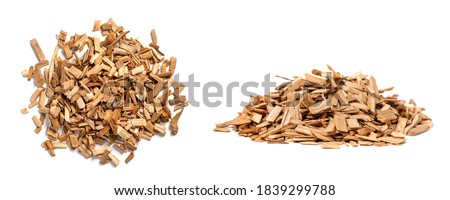 Oak chips for smoking meat and fish isolated on white background. Piles of wood chips from oak front and top view