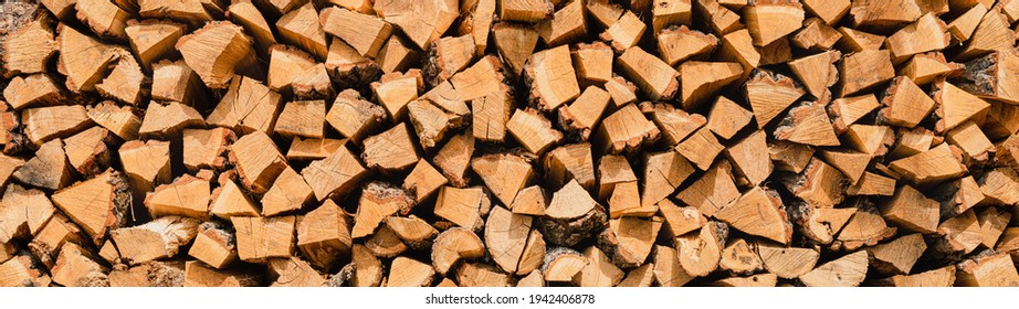 Oak chopped firewood stacked to form a texture panoramic. - Powered by Shutterstock