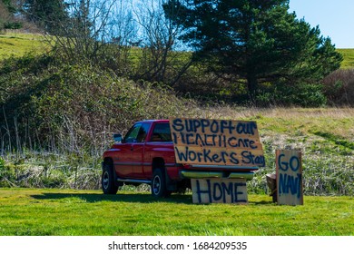 Oak Harbor, Washington / United States - March 20, 2020: A Local Puts Up A Sign After The Governor Jay Inslee Issues Stay At Home Order 