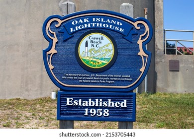 Oak Island North Carolina United States May 2, 2022 The blue Oak Island Lighthouse welcome sign