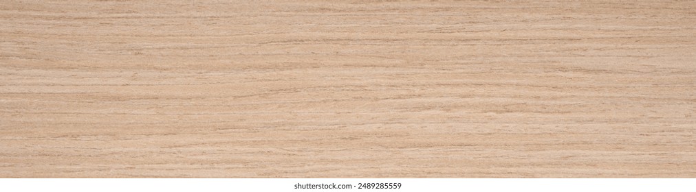 Oak veneer surface with a harmonious spread of honeyed tan tones and fine linear grain