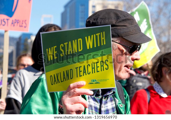 Oakland, CA -\
February 21, 2019: Oakland teachers strike outside of Oakland\
Technical High School, then marching to city hall. Fighting for\
smaller class sizes and bigger\
paychecks.