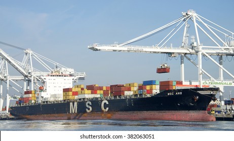 Oakland, CA - February 25, 2016: Cargo Ship MSC ANS loading at the Port of Oakland. The port loads and discharges more then 99 percent of containerized goods moving through Northern California