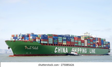 OAKLAND, CA - MAY 03, 2015: China Shipping Lines Cargo Ship CSCL SPRING entering the Port of Oakland. The Port of Oakland is the fifth busiest container port in the United States.