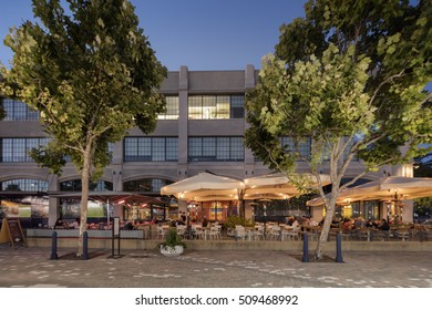 Oakland, CA, USA - July 30, 2016: Jack London Square with Restaurants and Nightlife. Jack London Square is a popular entertainment and business destination on the waterfront of Oakland, California
