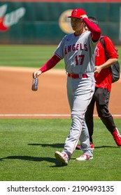 Oakland, California - August 10, 2022: Los Angeles Angels DH Shohei Ohtani Walks On The Field Before A Game Against The Oakland Athletics At The Oakland Coliseum.