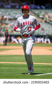 Oakland, California - August 10, 2022: Los Angeles Angels DH Shohei Ohtani Jogs To The Dugout During A Game Against The Oakland Athletics At The Oakland Coliseum.