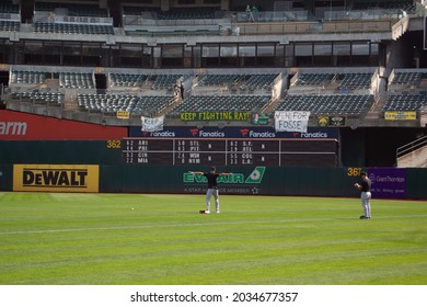 Oakland, California - August 28, 2021: New York Yankees Pitcher Jameson Taillon Warms Up In The Outfield Before A Game Against The Oakland Athletics At RingCentral Coliseum.