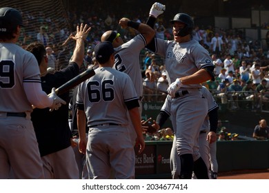 Oakland, California - August 28, 2021: Aaron Judge #99 And Rougned Odor #12 Of The New York Yankees Celebrate After Judge Hits A Home Run Against The Oakland Athletics At RingCentral Coliseum.