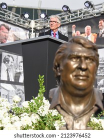 Oakland, California - February 14, 2022: KCBS Radio Anchorman Emetitus Stan Bunger, Behind The Hall Of Fame Bust Of Coach Madden, At  