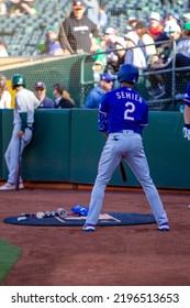 Oakland, California - July 23, 2022: Texas Rangers Second Baseman Marcus Semien In The On Deck Circle Before A Game Against The Oakland Athletics At The Oakland Coliseum.