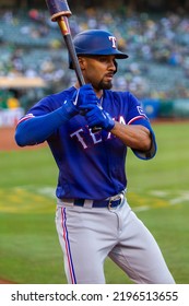 Oakland, California - July 23, 2022: Texas Rangers Second Baseman Marcus Semien In The On Deck Circle During A Game Against The Oakland Athletics At The Oakland Coliseum.