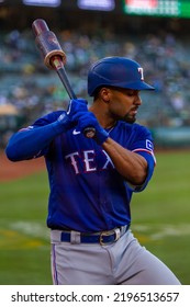 Oakland, California - July 23, 2022: Texas Rangers Second Baseman Marcus Semien In The On Deck Circle During A Game Against The Oakland Athletics At The Oakland Coliseum.