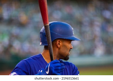 Oakland, California - July 23, 2022: Texas Rangers Second Baseman Marcus Semien In The On Deck Circle During A Game Against The Oakland Athletics At The Oakland Coliseum.