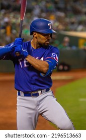 Oakland, California - July 23, 2022: Texas Rangers Second Baseman Marcus Semien In The On Deck Circle During A Game Against The Oakland Athletics At The Oakland Coliseum.