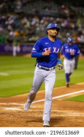 Oakland, California - July 23, 2022: Texas Rangers Second Baseman Marcus Semien Scores A Run During A Game Against The Oakland Athletics At The Oakland Coliseum.