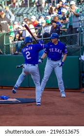 Oakland, California - July 23, 2022: Texas Rangers Second Baseman Marcus Semien And Shortstop Corey Seager Swing Before A Game Against The Oakland Athletics At The Oakland Coliseum.