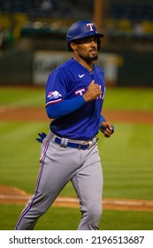 Oakland, California - July 23, 2022: Texas Rangers Second Baseman Marcus Semien Jogs To The Dugout During A Game Against The Oakland Athletics At The Oakland Coliseum.