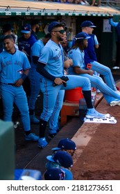 Oakland, California - July 5, 2022: Toronto Blue Jays Santiago Espinal, Lourdes Gurriel Jr. And Vladimir Guerrero Jr. In The Dugout At The Oakland Coliseum.