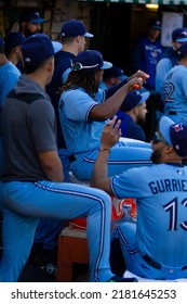 Oakland, California - July 5, 2022: Toronto Blue Jays Infielder Vladimir Guerrero Jr. Pretends To Row With The Gatorade Stirring Stick In The Dugout During A Game At The Oakland Coliseum.