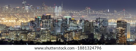 Oakland and San Francisco Skyline Panorama with Holidays Lights via Oakland Hills