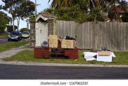 Oakleigh, VIC / Australia - Aug 27 2018: Cabinet And Miscellaneous Hard Rubbish Put On Curbside For Council Annual Collection