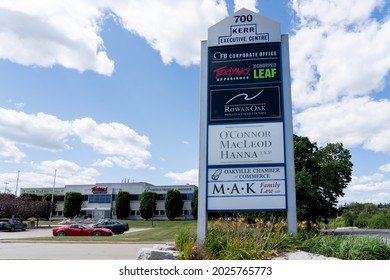 Oakville, On, Canada - August 2, 2021: A Sign At Kerr Executive Centre In Oakville With Logos Of FB, Teriyaki, Chopped Leaf, Rowan Oak, OConnor Macleod, Oakville Chamber Commerce And MAK Family Law. 