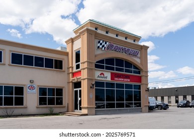 Oakville, On, Canada - August 2, 2021: Oaktown Collision Centre In Oakville, On, Canada. Oaktown Collision Centre Is An Auto Body Shop. 