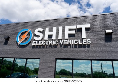 Oakville, On, Canada - August 2, 2021: Close Up Of SHIFT Electric Vehicles Sign On The Building In Oakville, On, Canada, A Toronto Area Motor Vehicle Dealer Specializing In EV's And Enthusiast Vehicle