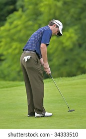 OAKVILLE, ONTARIO - JULY 22: Canadian Golfer Mike Weir Putts During A Pro-am Event At The Canadian Open Golf On July 22, 2009.
