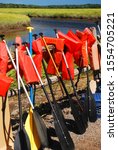 Oar and lifejackets are set for canoers to begin their journey