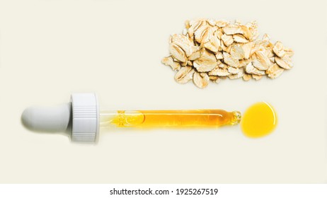 Oat Avena Sativa Kernel Oil With Pipette In The White Background.