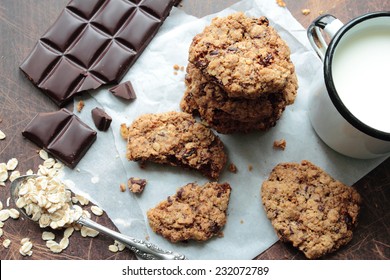 Oat Cookies With Chocolate And Mug Of Milk