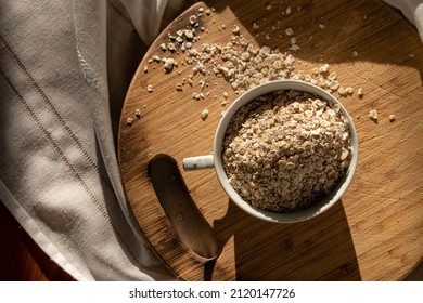 Oat Fakes On Wood Chopper In White Tea Cup