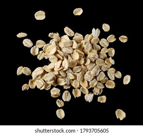 Oat Flakes, Cereal For Breakfast Isolated On Black Background, Top View