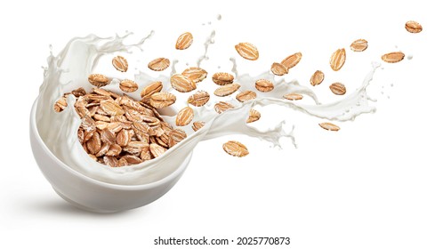 Oat flakes with milk splashes isolated on white background with clipping path
