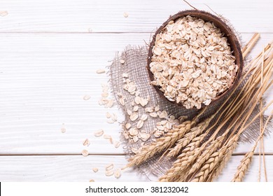 oat flakes on wooden table.healthy food concept. - Powered by Shutterstock