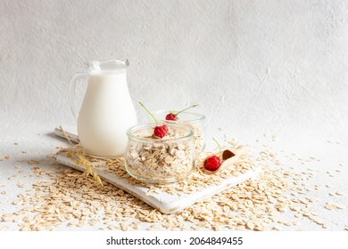 Oat Flakes, Out Milk And Rasberry On A Table. Plant-based Healthy And Vegetarian Eating And Drink. Selective Focus, Close Up