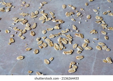 Oat Flakes Are Scattered On The Table, Top View.