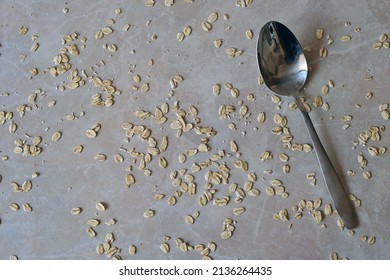 Oat Flakes Are Scattered On The Table, Top View.