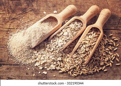 Oat flakes, seeds and bran in spoons - Powered by Shutterstock