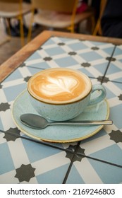 Oat Flat White Served In Teal Cup In The Restaurant, Alternative Milk Coffee Art