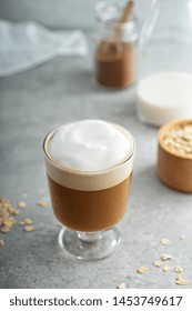 Oat Milk Latte With Thick Foam In A Glass